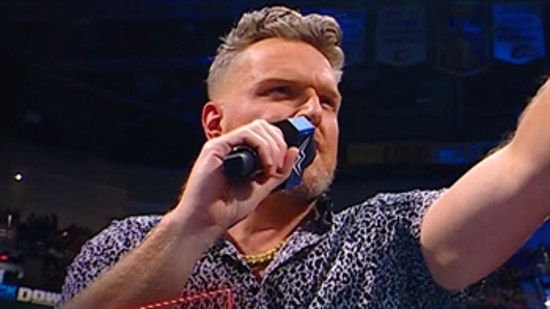 Pat McAfee congratulates Big E during the